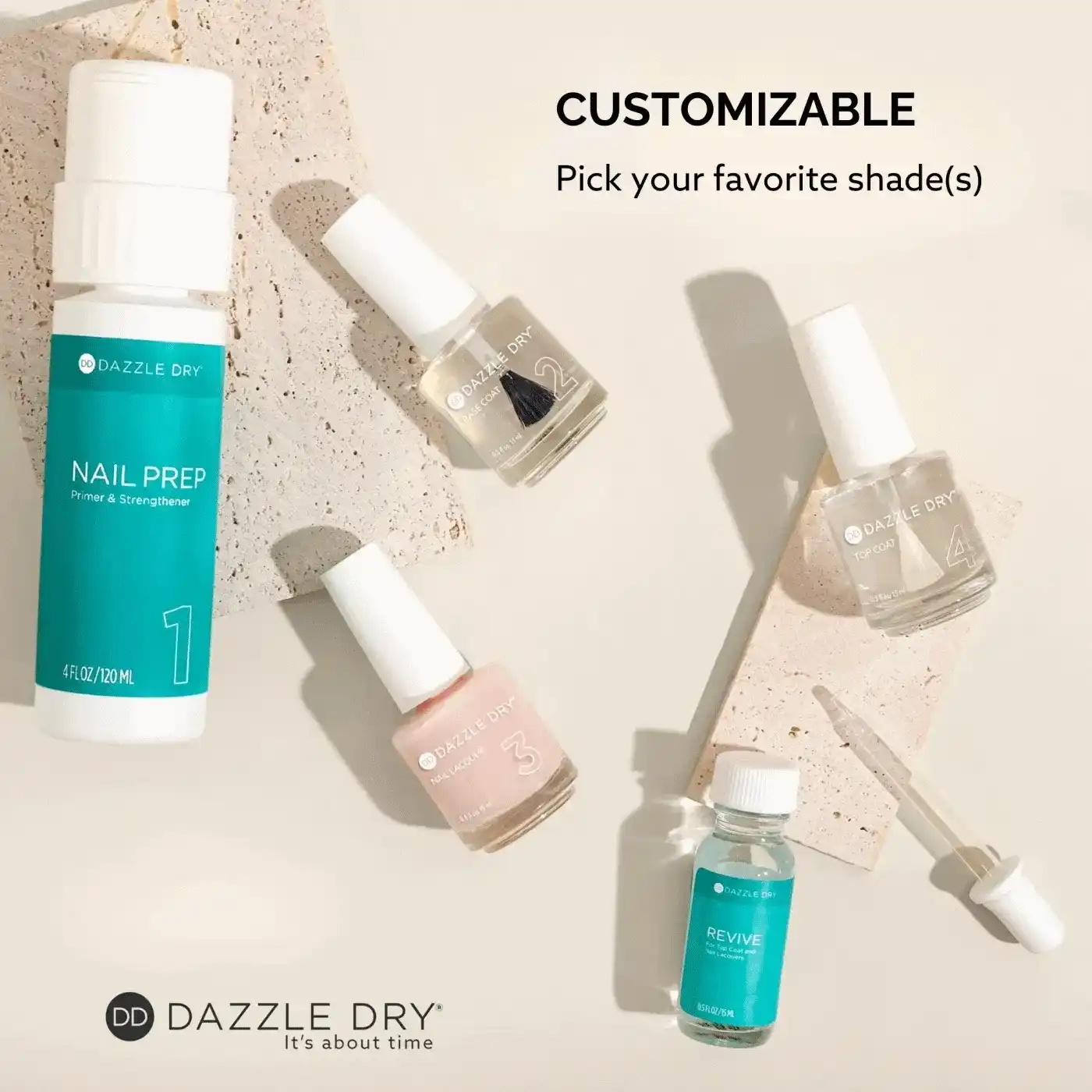 Nail care products displayed on stone slabs with customizable shade options.